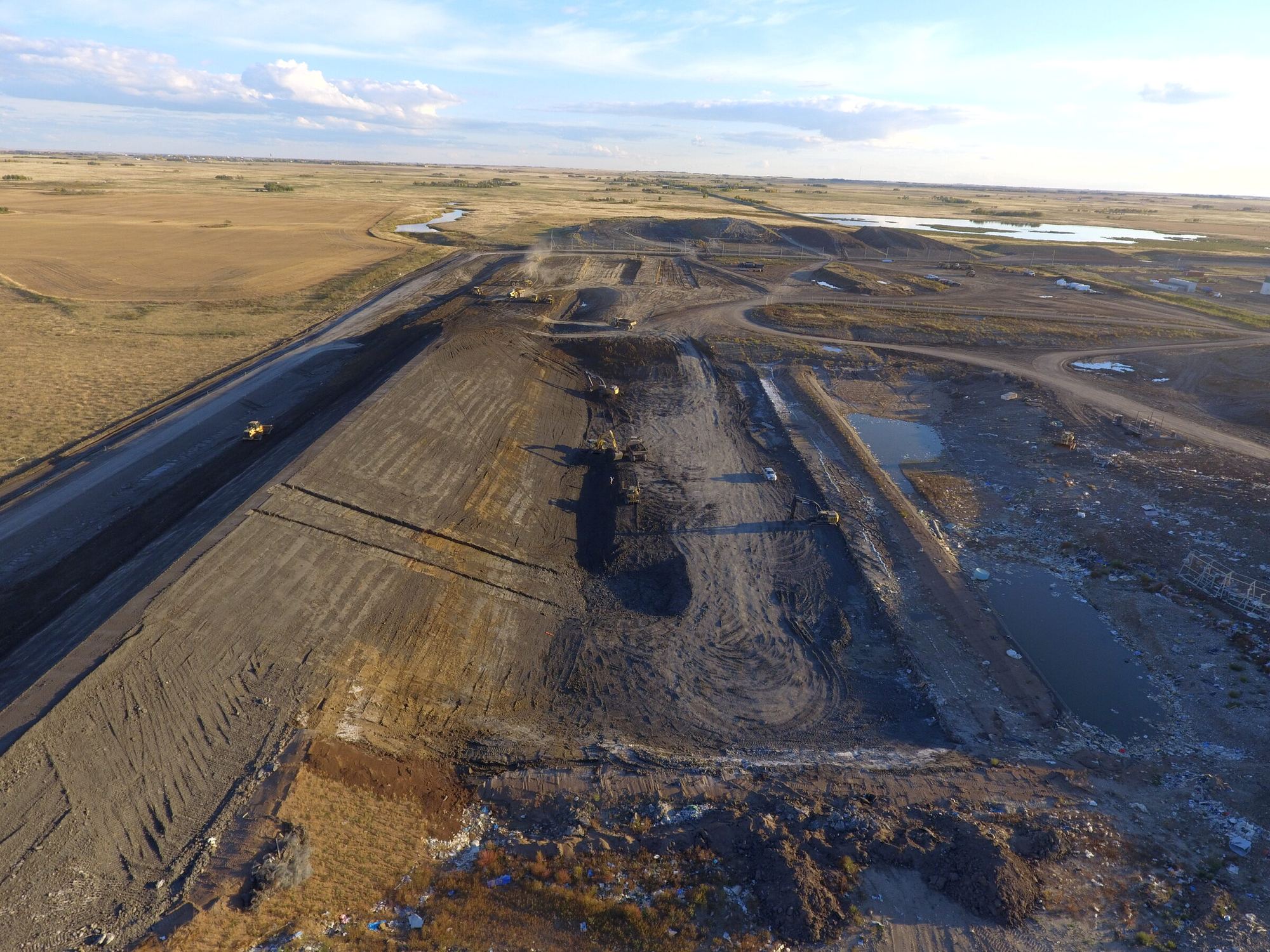Aerial view of a BTO Contracting landfill cell under construction on the Alberta prairie